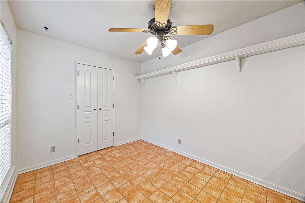 Breakfast room showing doors leading to laundry and garage.