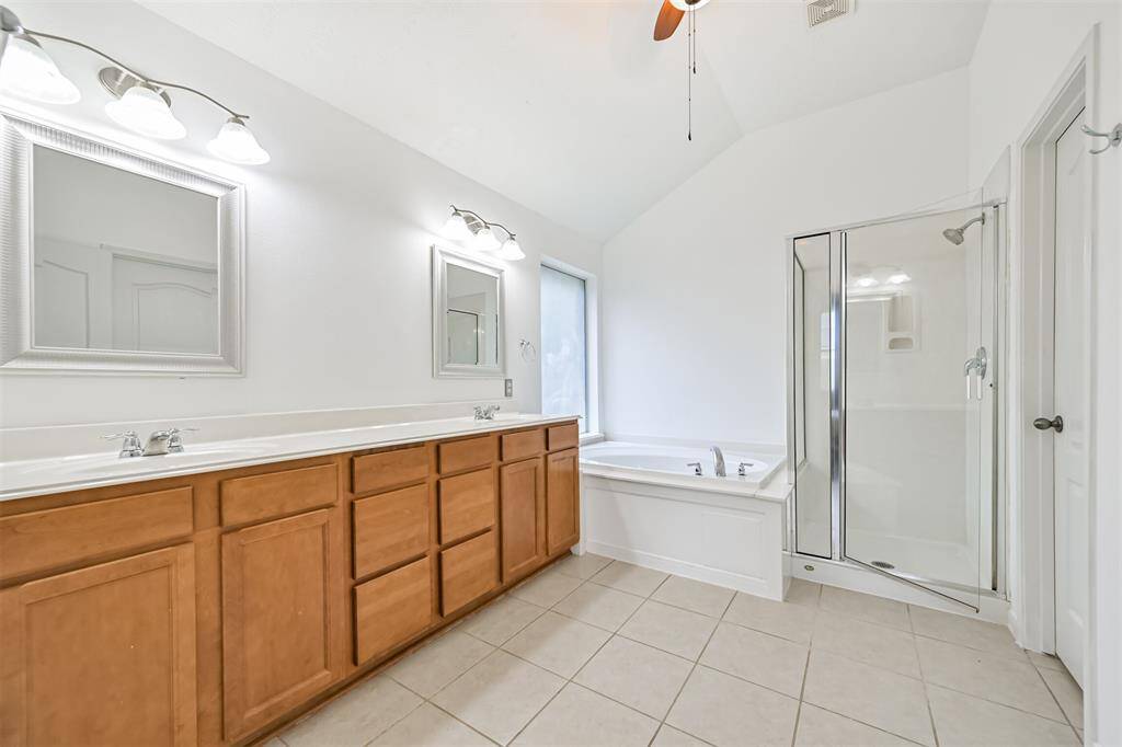 Primary bathroom with garden tub and shower