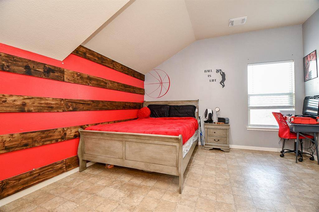 One of three upstairs bedrooms.