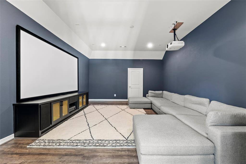 A home media room offers a dedicated space for enjoying movies, sports, and gaming. It's the perfect retreat for family entertainment or hosting unforgettable movie nights with friends.