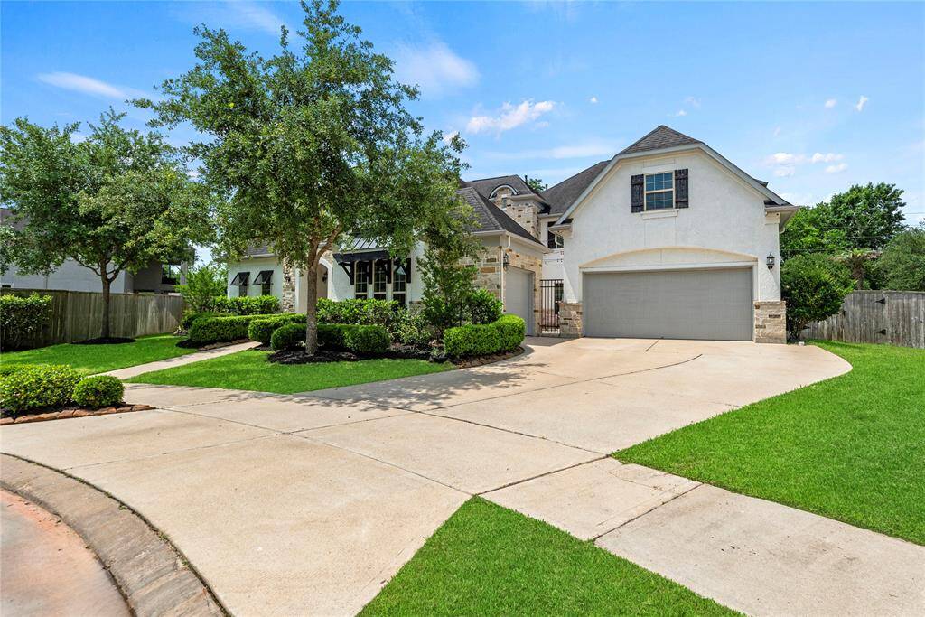 This home features a spacious 3-car garage, offering plenty of room for vehicles, storage, or a workshop setup. The double-wide driveway provides ample parking space and easy access for multiple cars.