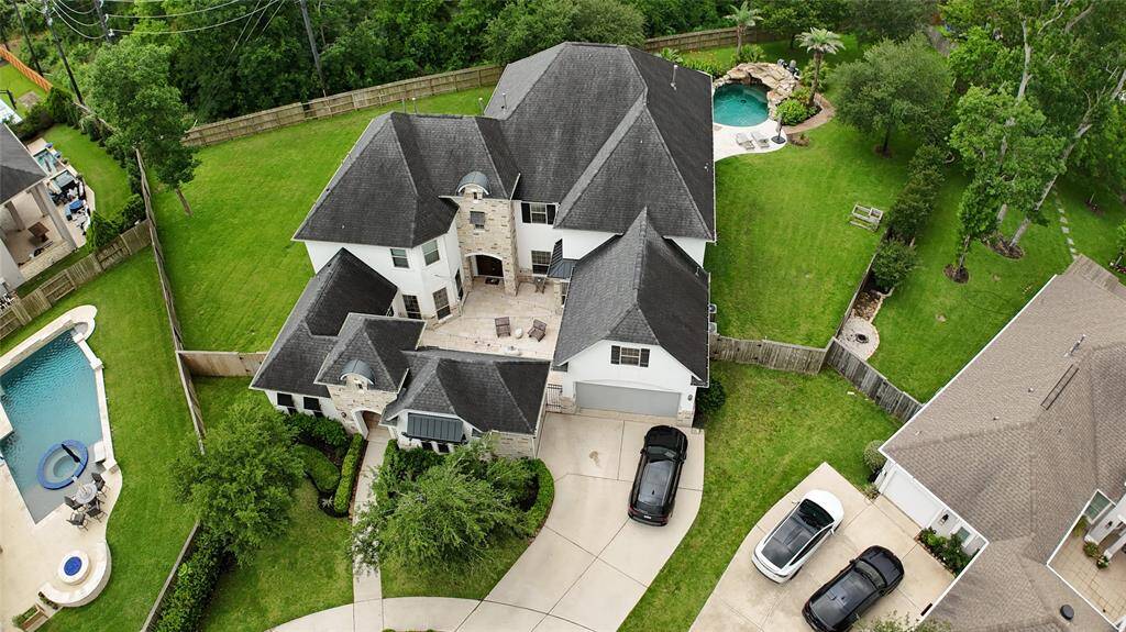 From the aerial view, this stunning two-story home in the prestigious gated community of Bees Creek in Sienna truly stands out.