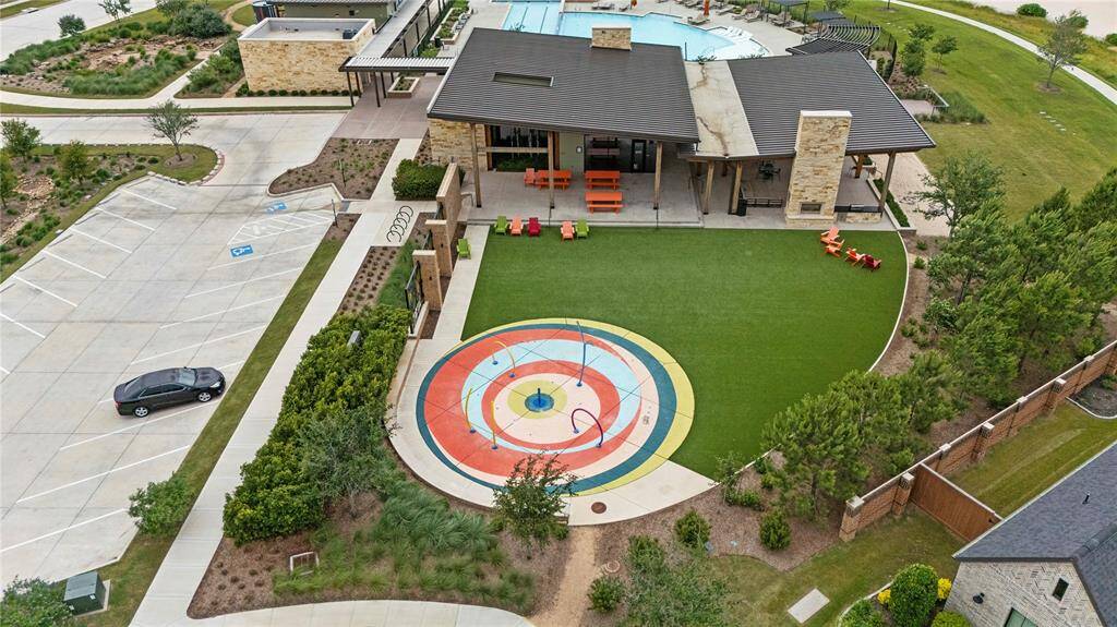 Play area with a splash pad.