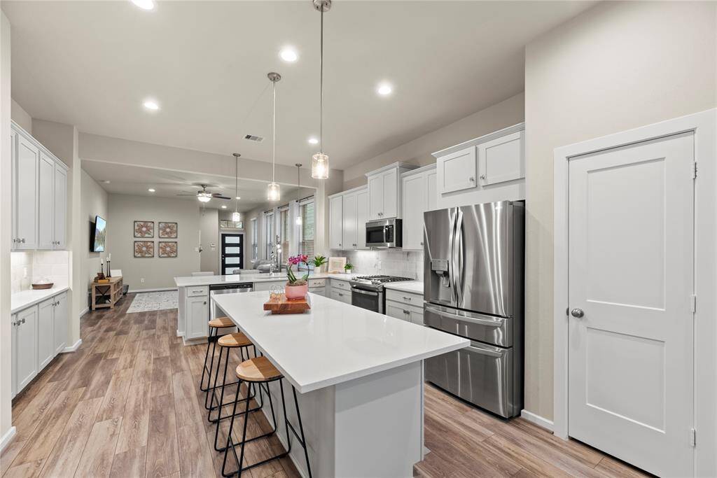 Another view of the kitchen. This open floor plan is perfect for entertaining.