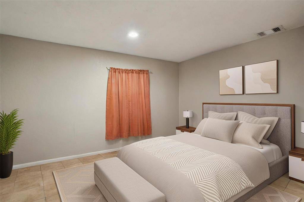 One of the unit 2 bedrooms. [virtually staged]