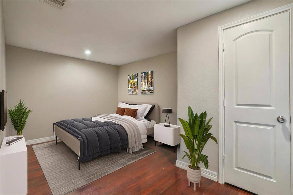 One of the bedrooms in unit 3. [virtually staged]