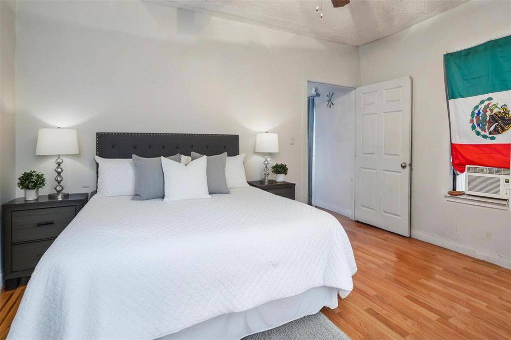 One of the bedrooms in unit 1. [virtually staged]