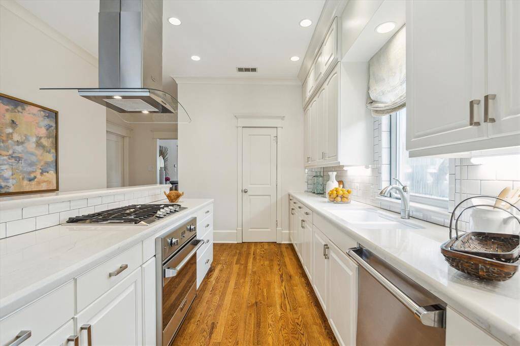 Walk-in pantry at one end of the kitchen.