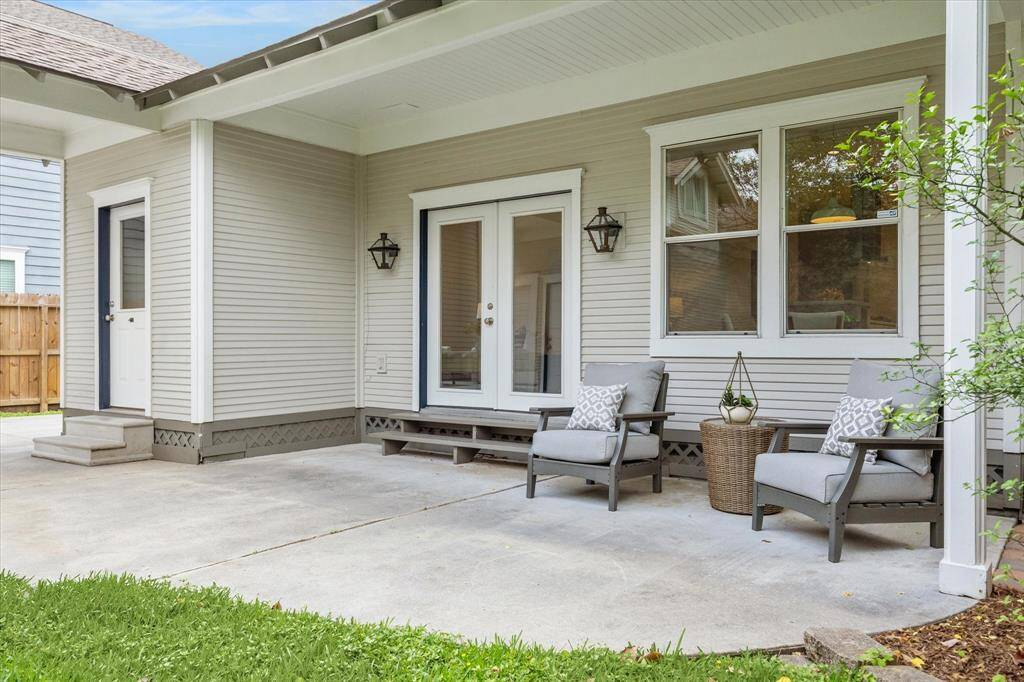 French doors from the den open to the covered patio.