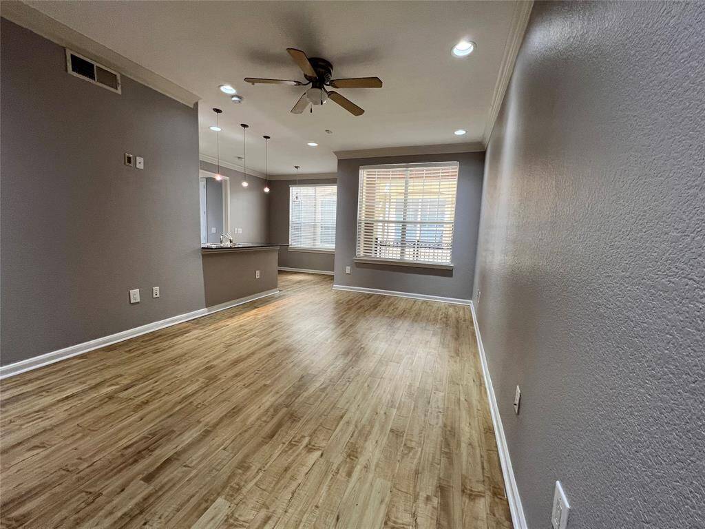 The unit has been freshly painted. Enjoy luxury vinyl flooring in the main living areas.