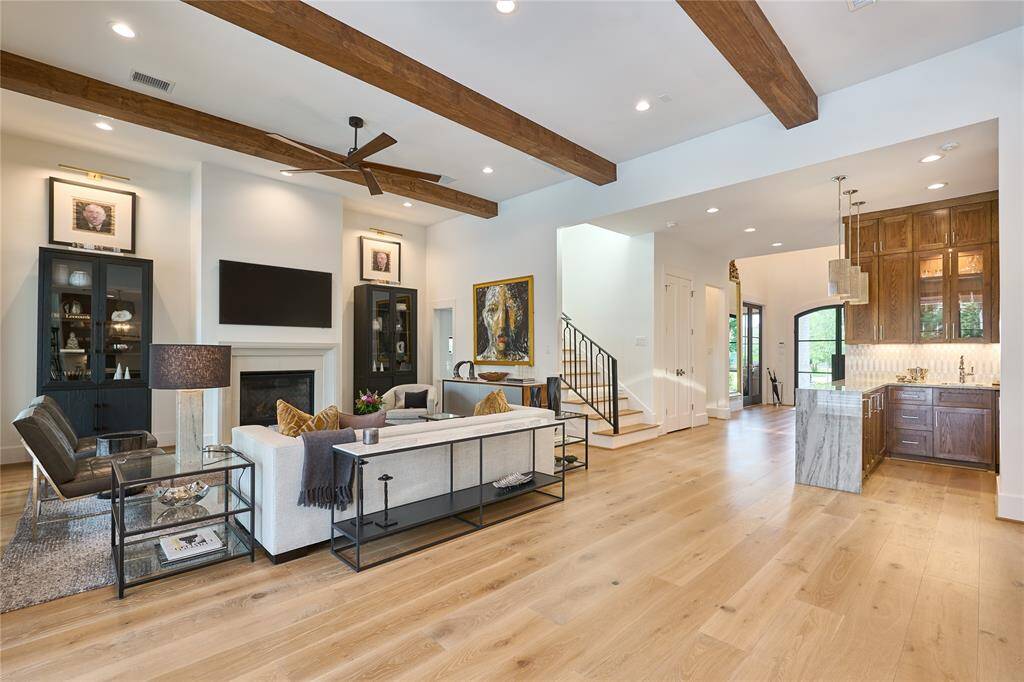 The spacious living room is ideally located just off the bar and kitchen, offering effortless flow for entertaining and everyday living.
