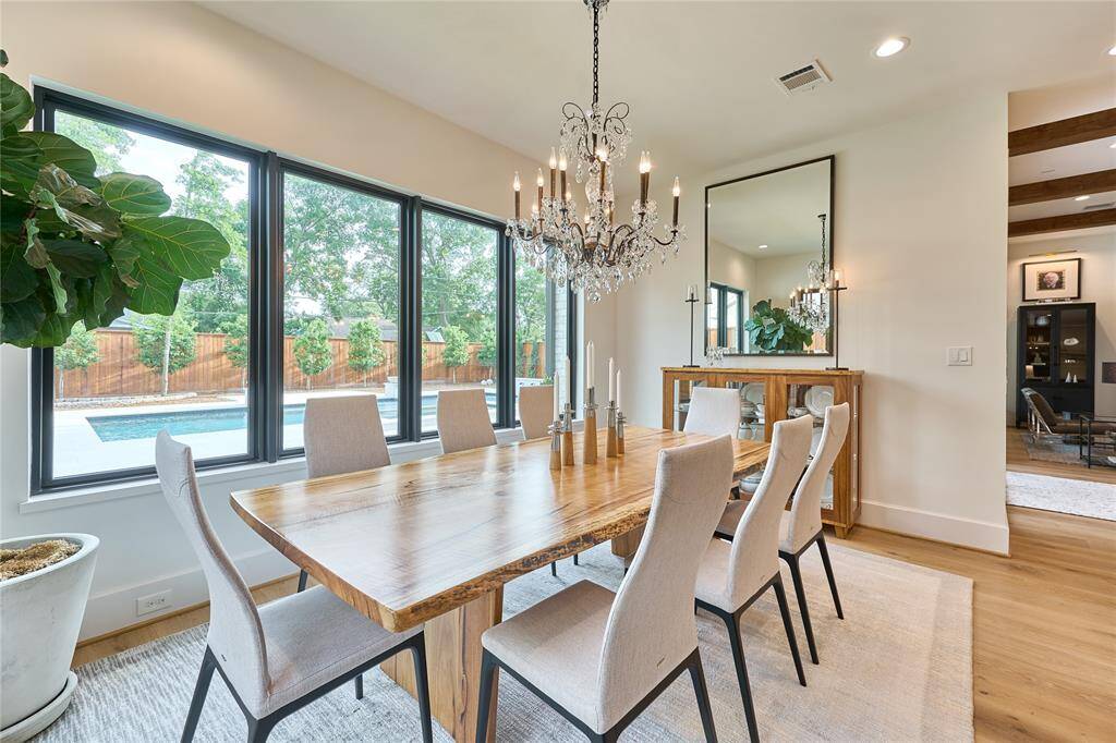 Elegant formal dining room, ideally situated just off the kitchen, perfect for hosting intimate gatherings or dinner parties.