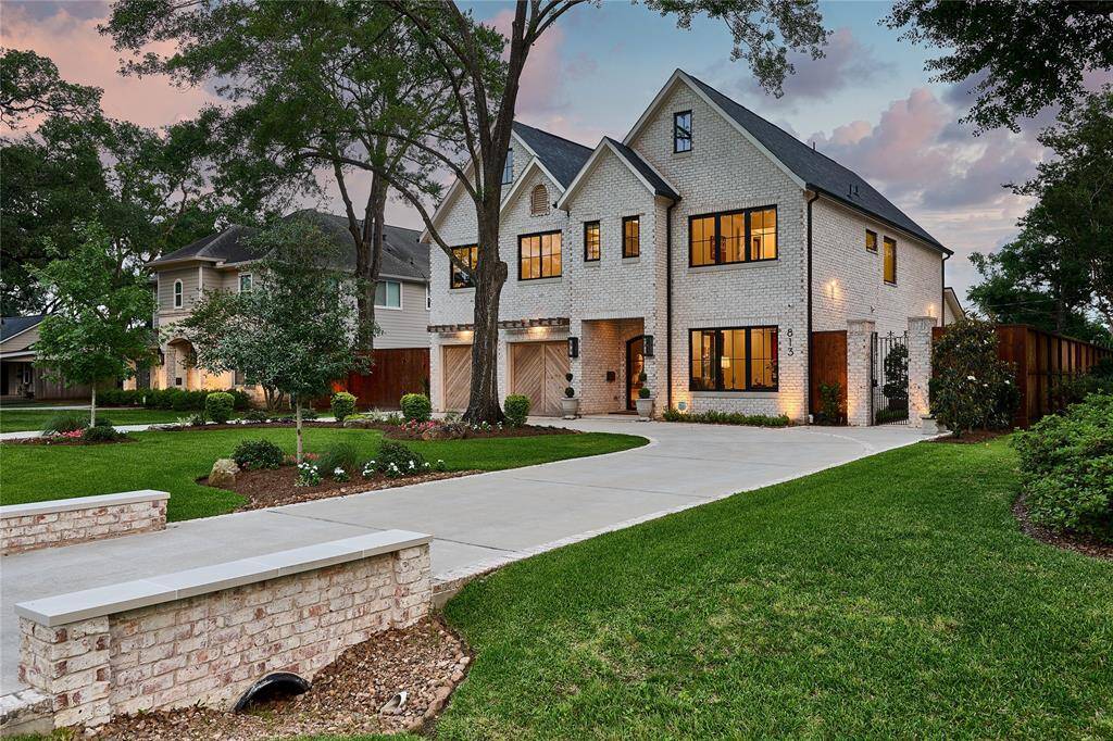 Situated on a generous 14,000-square-foot lot, the property features a circle driveway with an additional parking space for added convenience. Welcome home!