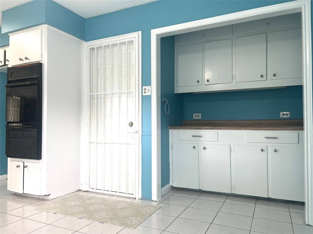 Great space for a coffee bar! All of the cabinet storage you could ever want!