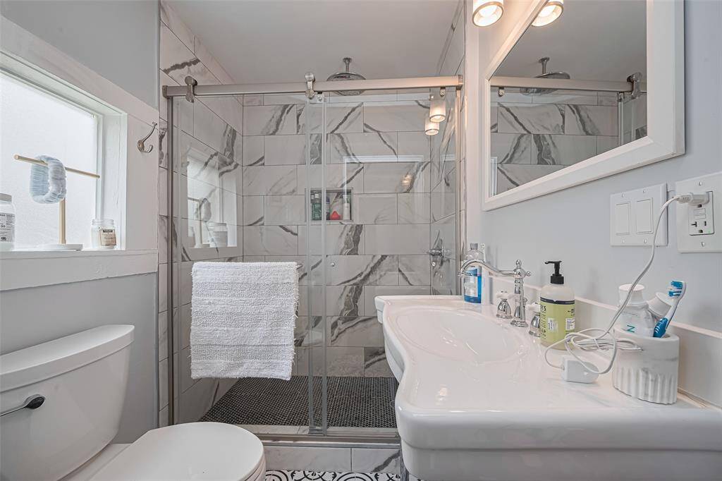 Updated bathroom with walk in shower.