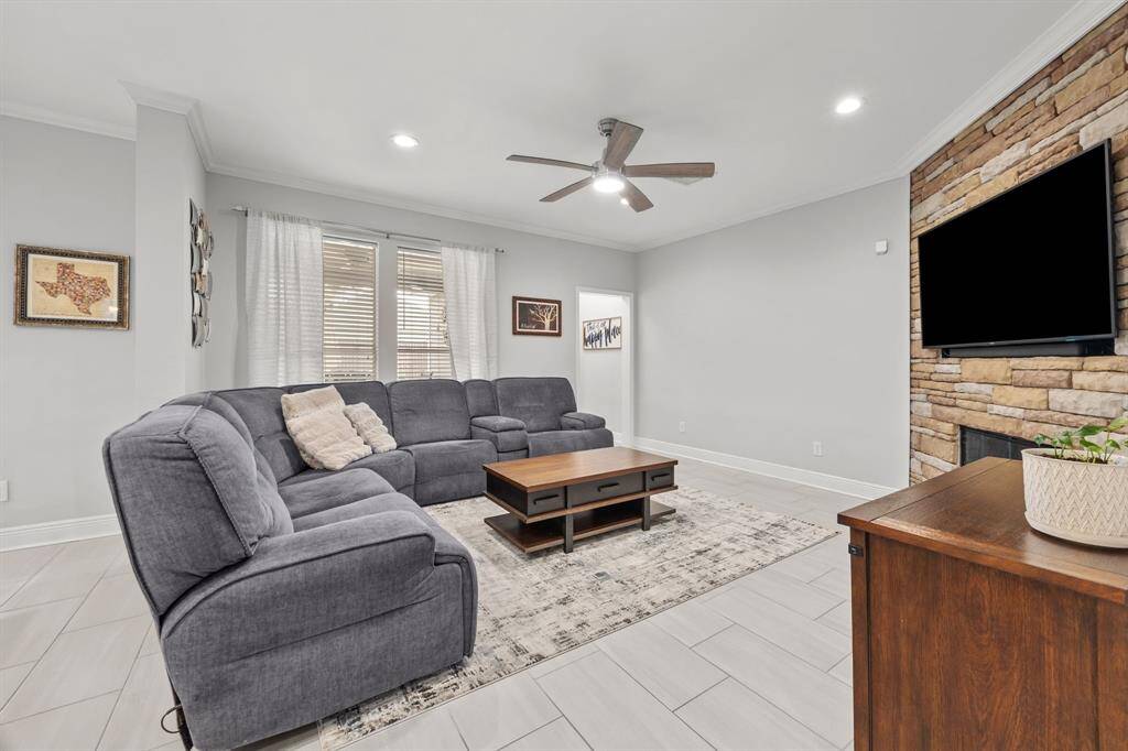 Spacious family room perfect for all your furniture and entertainment needs.