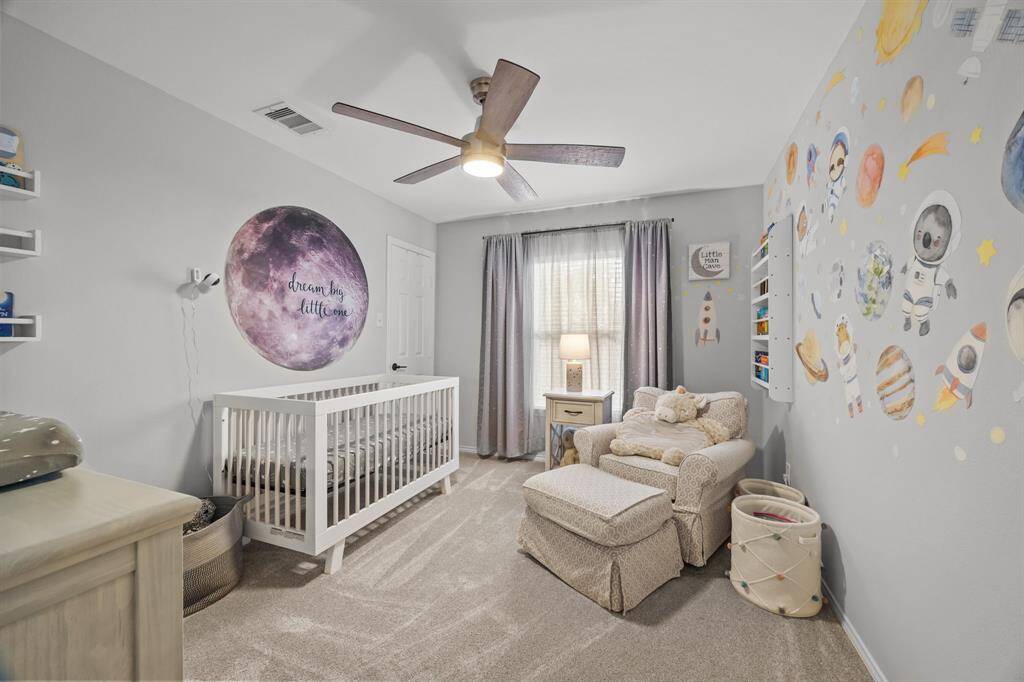 Spacious fourth bedroom, perfect for versatile family needs.