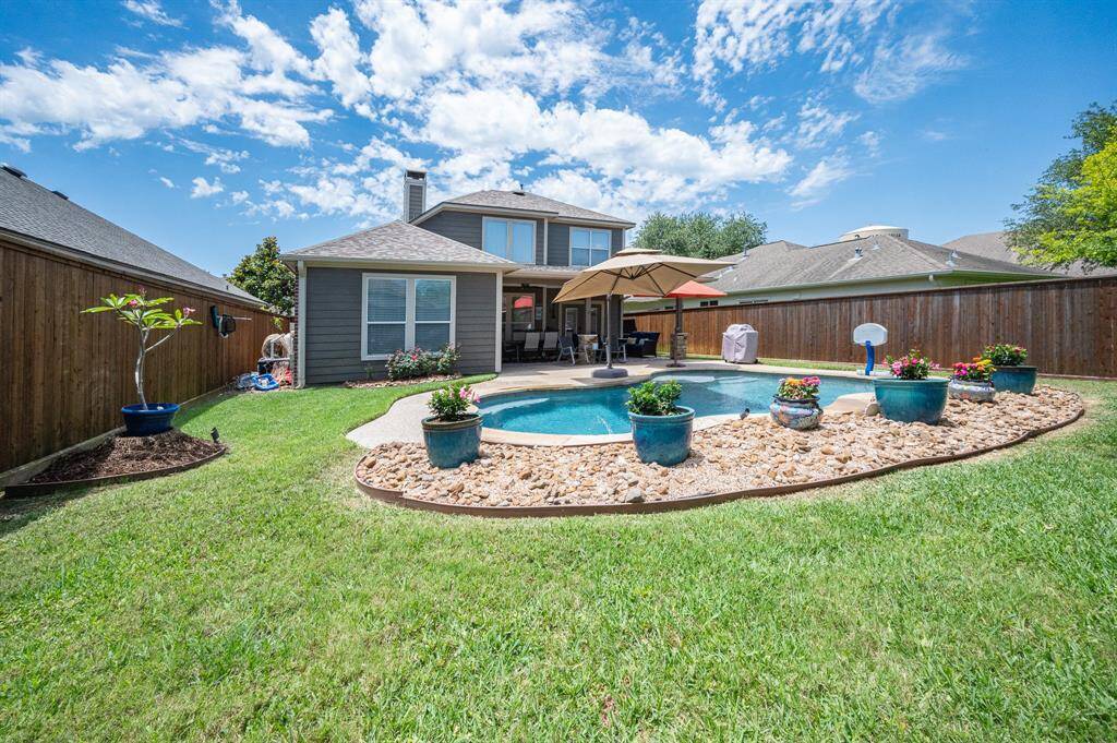 Enjoy summer fun with ample grassy space for family activities.