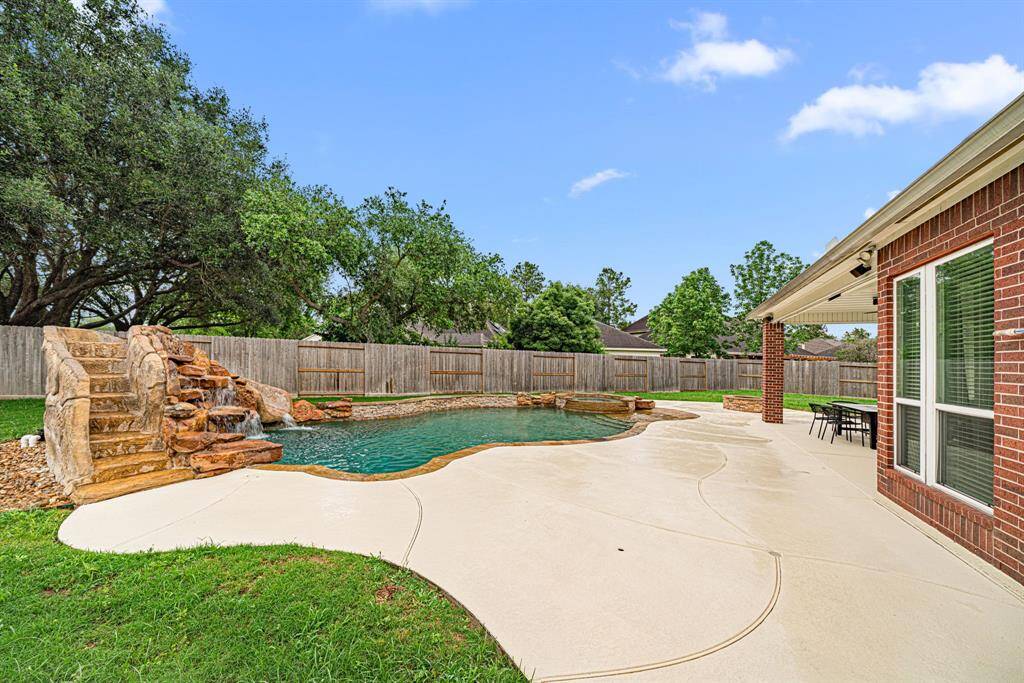 The oversized cul-de-sac lot provides ample room to roam. This is outdoor living perfected - where every day feels like a vacation in your own private sanctuary.