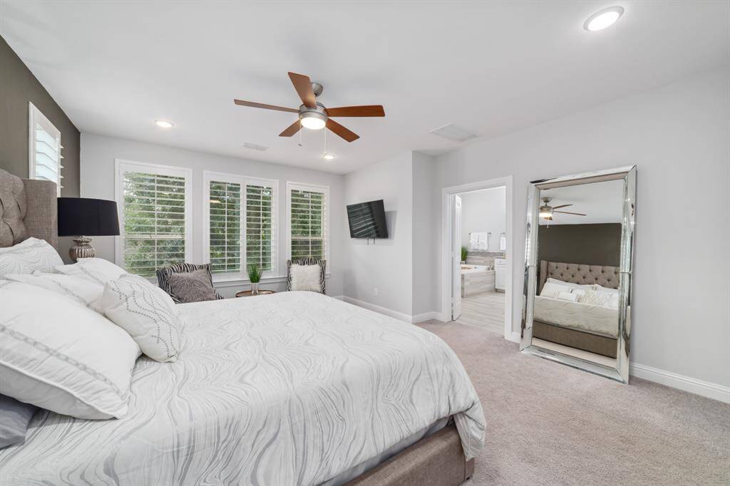 Primary Bedroom with an extended sitting area.