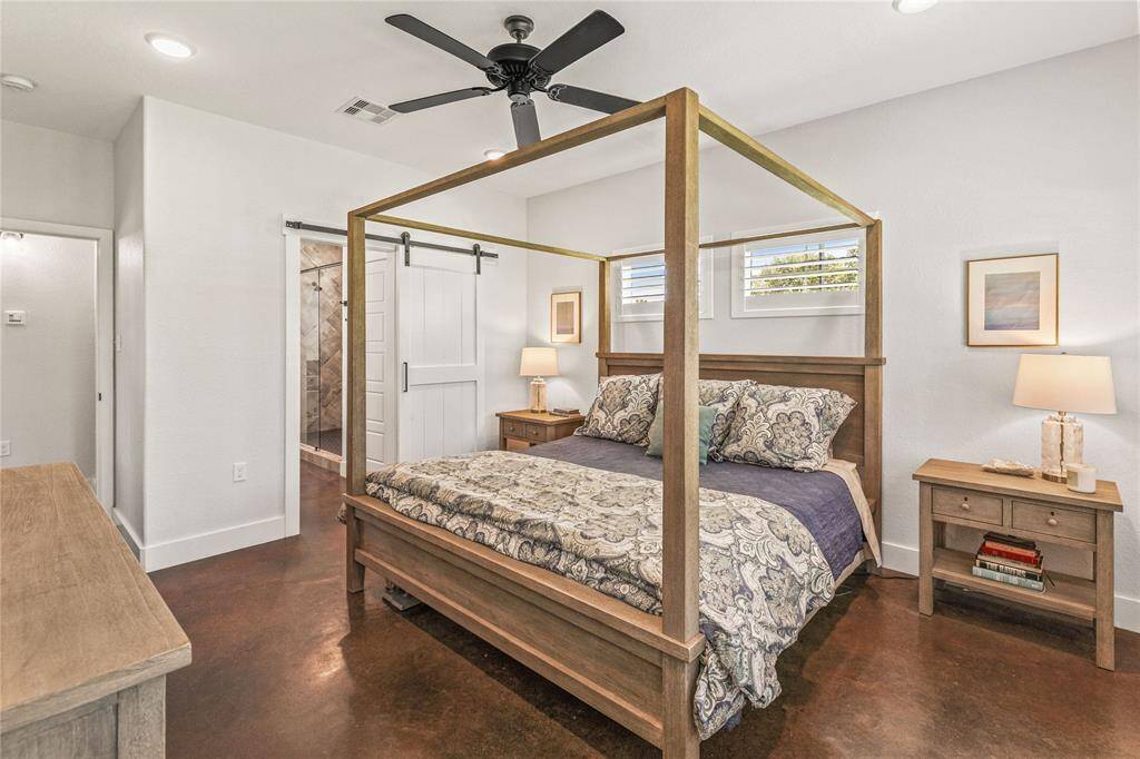 Primary Bedroom over looking the gorgeous backyard with primary en suite.
