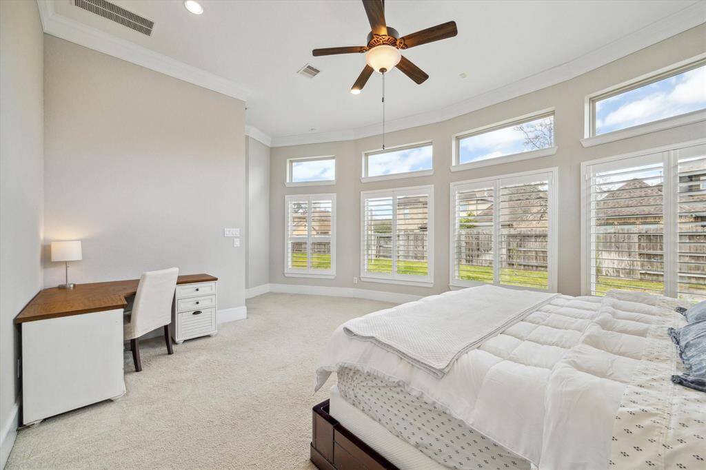 This owner's retreat is a beautiful space to begin and end your day with luxurious finishes, soft neutral paint and carpet, and amazing natural light.