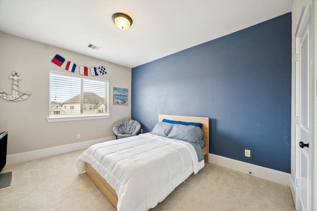 With four spacious bedrooms - all with ensuite bathrooms, you will always have room for company. This guest bedroom offers plush carpet, designer paint, a large closet and ensuite access to a full bathroom.
