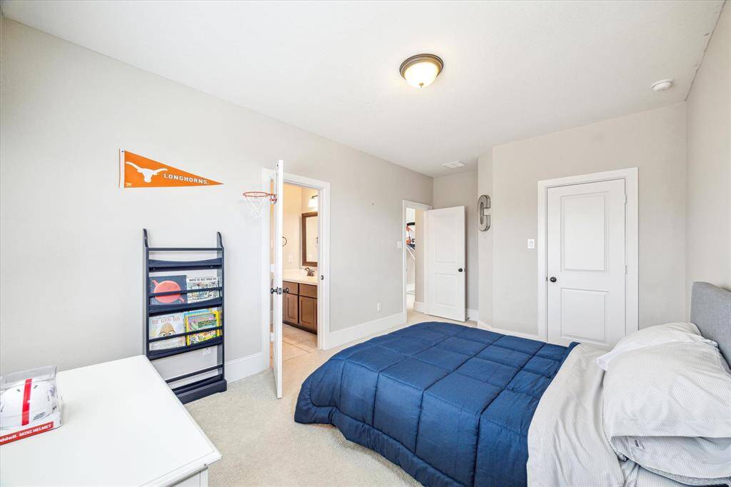 Your family or guests will rest comfortably in this roomy suite with plush carpet, neutral paint, a large closet and ensuite access to a full bathroom.