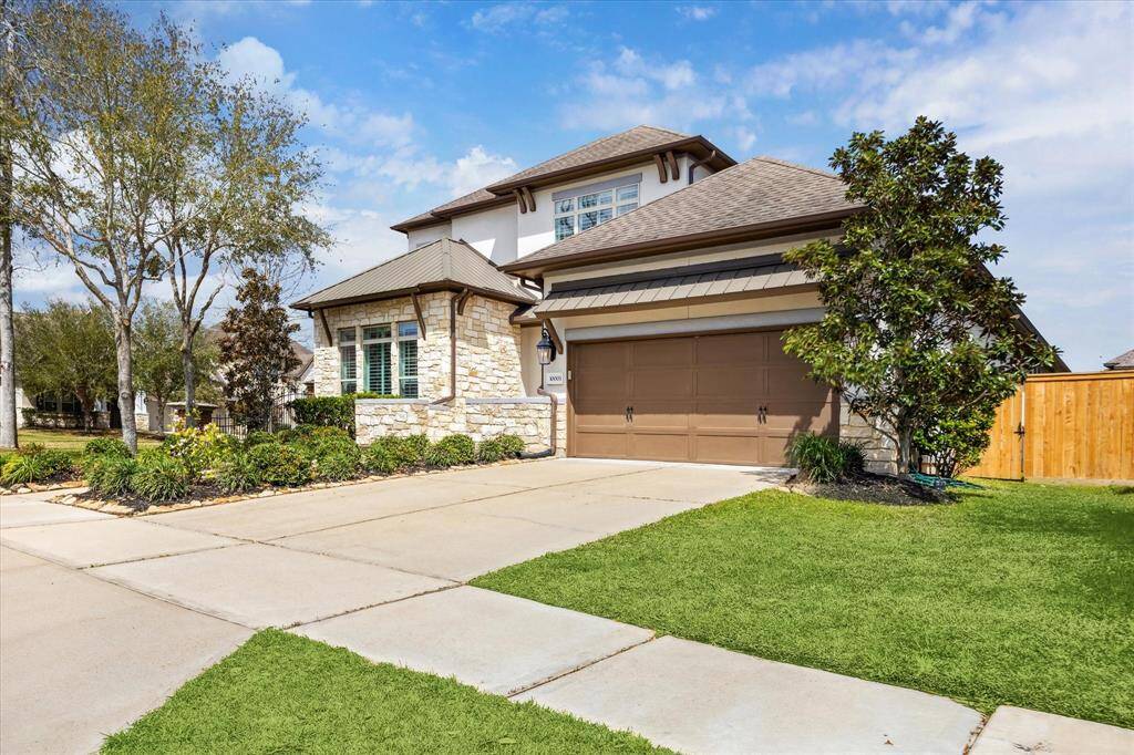 Off-street parking won't be an issue with a double-wide driveway and an oversized three-car garage.