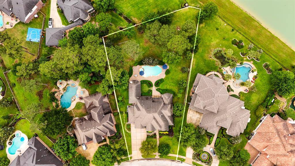 An aerial view of the home as it sits on the lot.  . The home is conveniently located to the Grand Parkway with quick access to The Woodlands, Spring and Tomball.