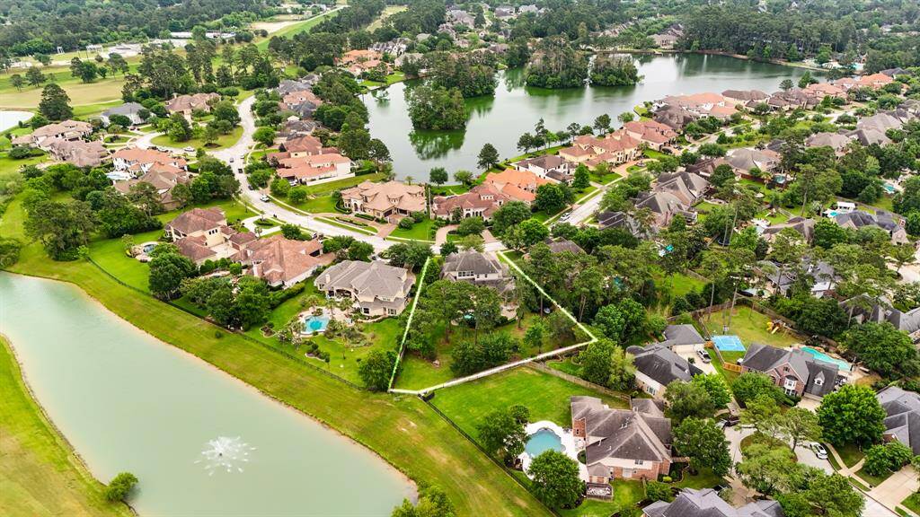 An aerial view of the home, showing this amazing lot, which is one of the largest lots in the section, you wonderful views for your enjoyment as well as the golf course views.