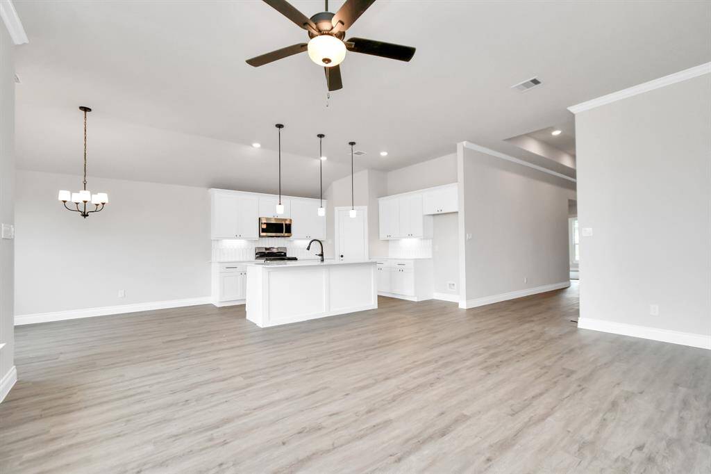 Open concept kitchen with kitchen island