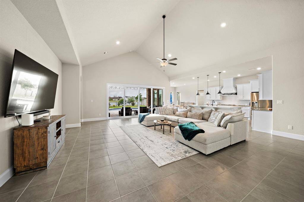Open living space showing dining and kitchen spaces