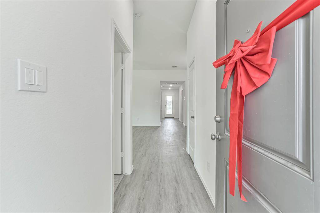 Step inside and discover the spacious interior of this 4-bedroom, 2-bathroom home.