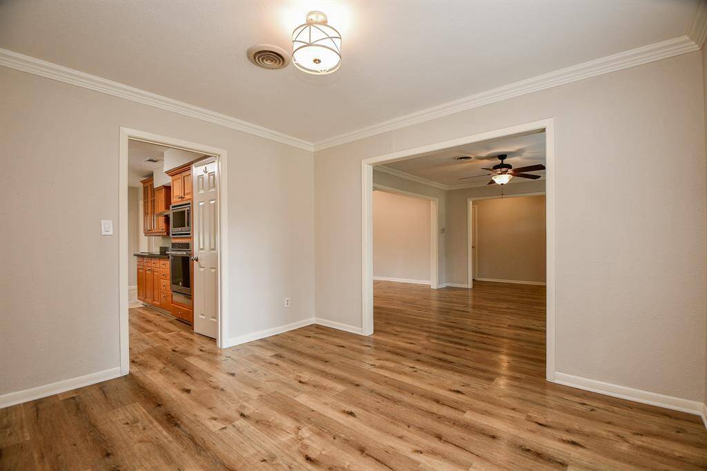 This ample, entertaining area is also perfect as a formal dining room, right off the kitchen!