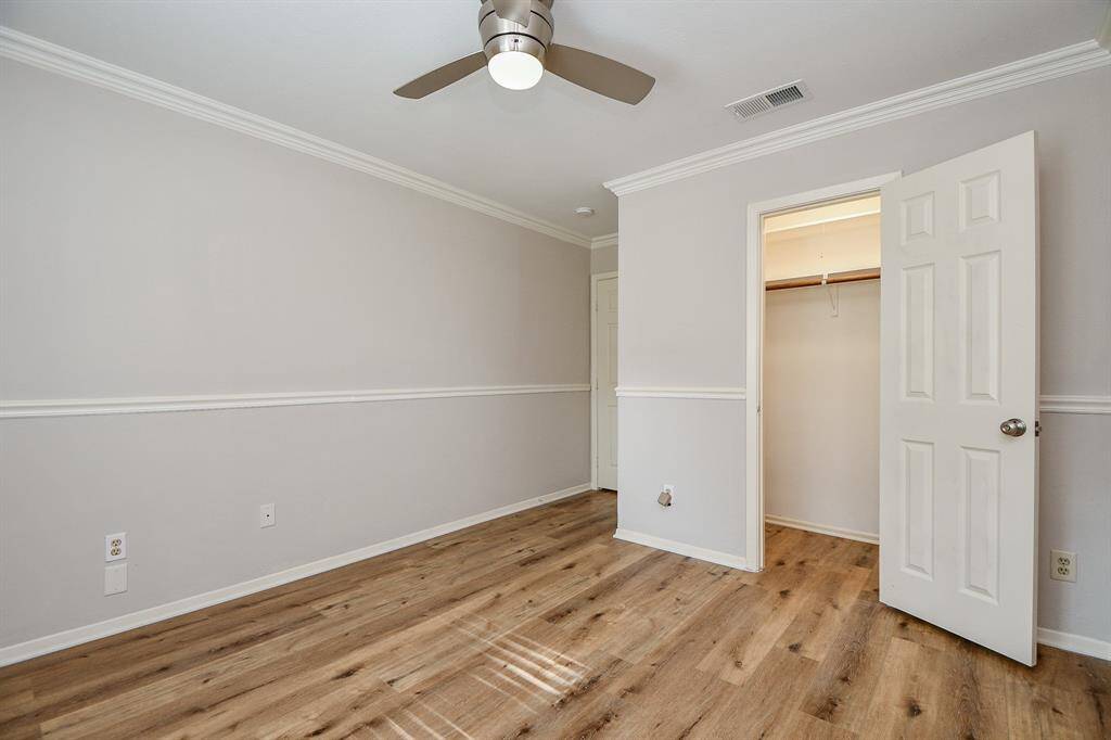 Storage and organization are plentiful in this bedroom closet.