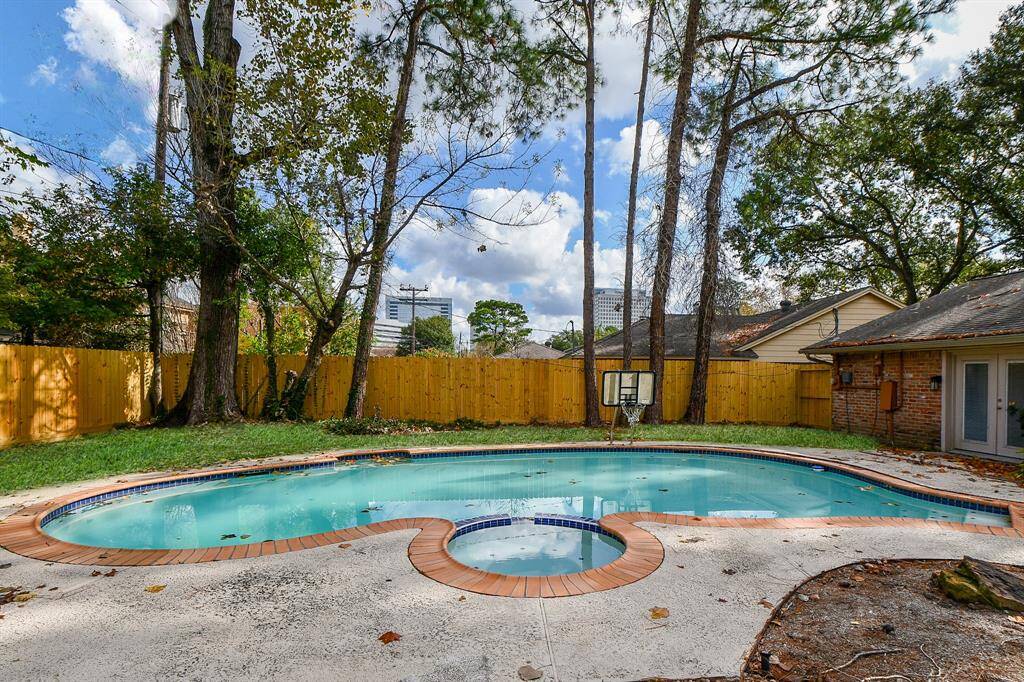 Your gorgeous back yard and this aquamarine paradise are fenced in for added privacy, security and comfort.