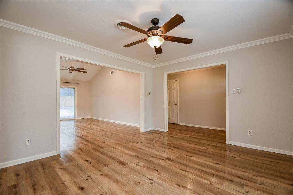 You'll easily discover and embrace the beauty and versatility of the tremendous space here in this open floor plan home! The architect/builder gives you wide open space and leaves it to you to create your lifestyle statements!