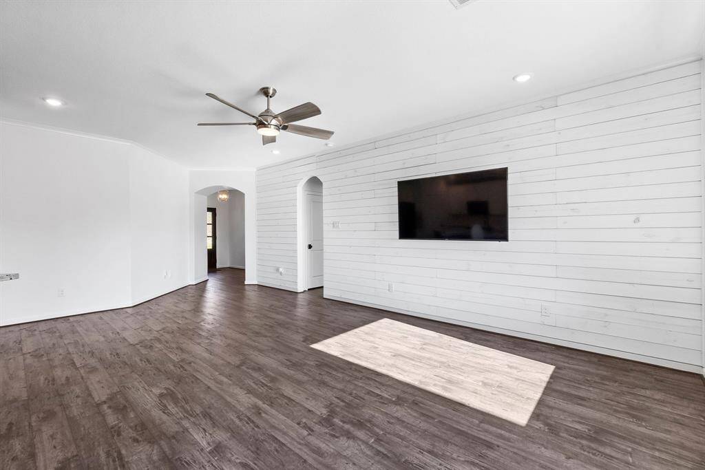 Master bedroom with wall mounted TV
