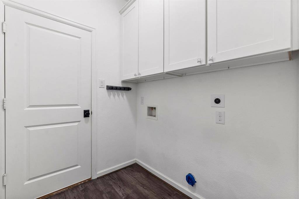 Launry room with cabinets for storage