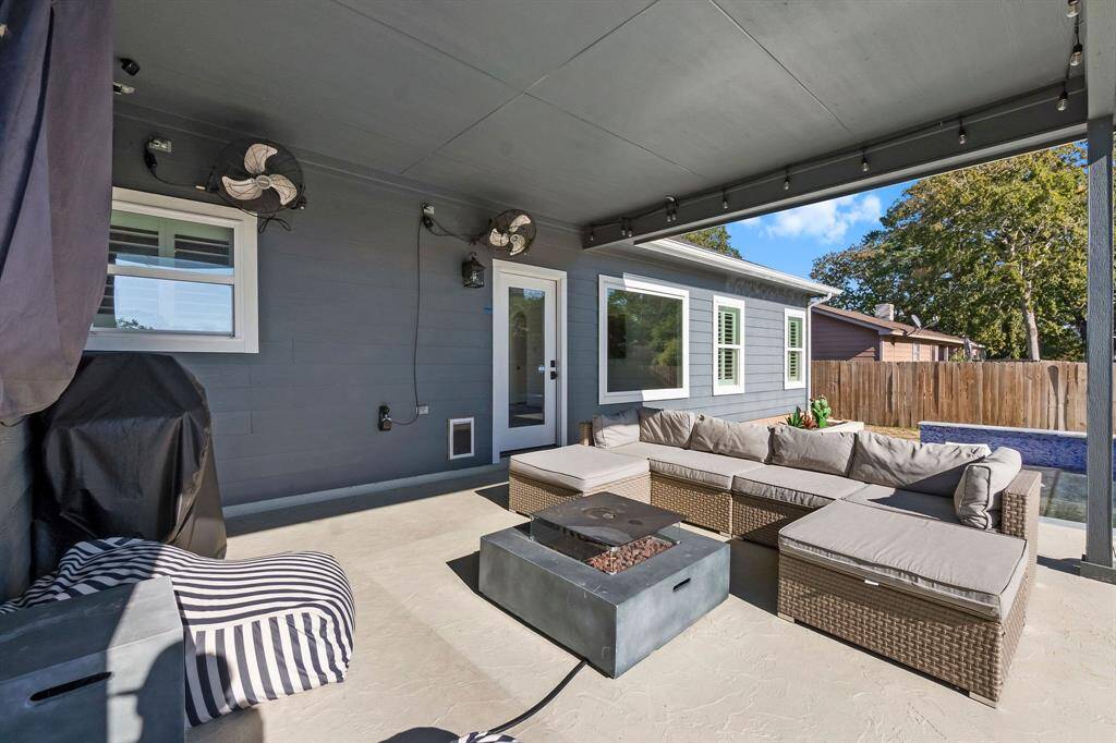 Back patio with fans to keep you cool while enjoying the view