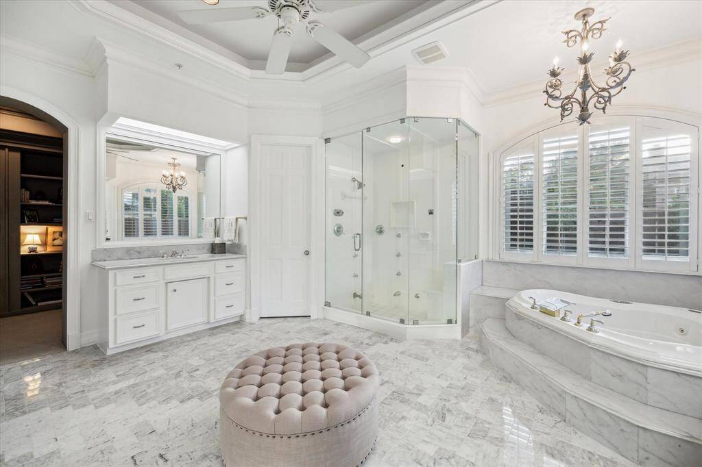 Another view of the incredible space the primary en suite bath includes.