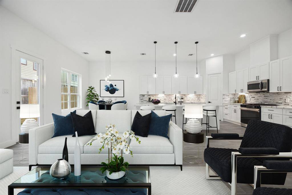 Here is one option of furniture placement in this virtually staged photo