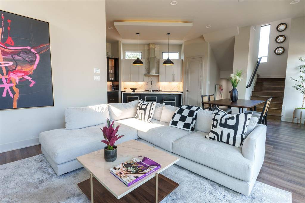 Open Concept Living! Notice the Floating Ceiling with ambient lighting. Living and dinning also feature Dimmer light switches to add more ambient lighting.