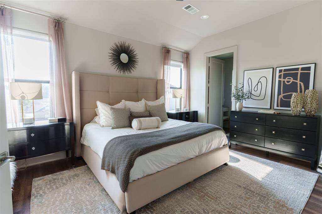 Primary features a spacious bedroom, walk-in closet and luxurious bathroom