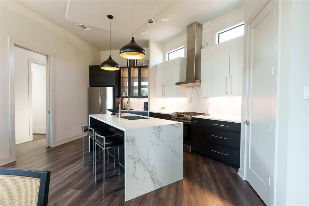 Waterfall Island in kitchen with Neolith Counter tops