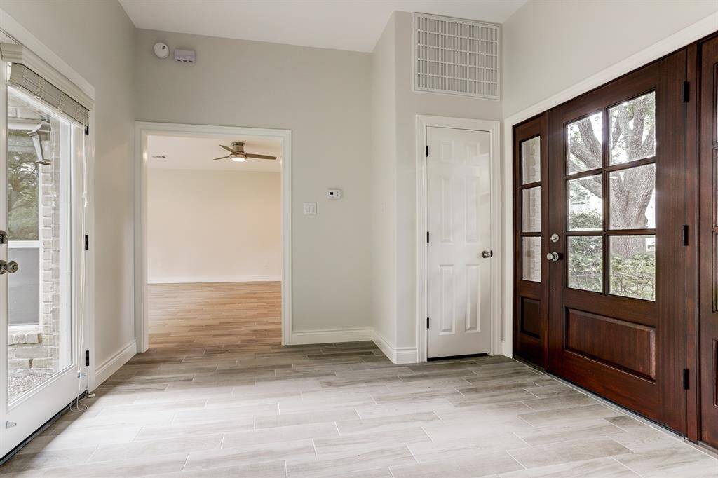 The front foyer with direct views to the backyard.