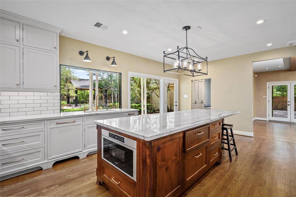 Recently updated kitchen featuring sleek countertops, modern appliances, ample cabinetry, and a spacious layout perfect for everyday cooking and entertaining.