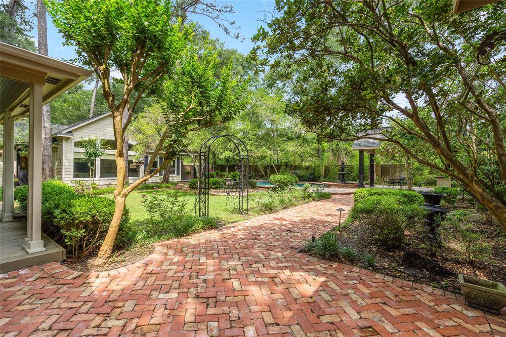 New Orleans–inspired setting with brick and stone details, tranquil fountains, and lush greenery—your own private retreat.