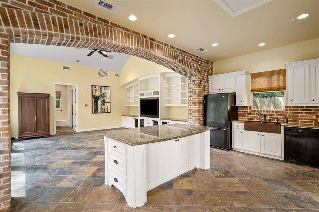 Fully equipped kitchen in the guest house, complete with modern appliances, ample counter space, and custom cabinetry. Perfect for preparing meals or entertaining, providing all the conveniences of home in a private, self-contained retreat.